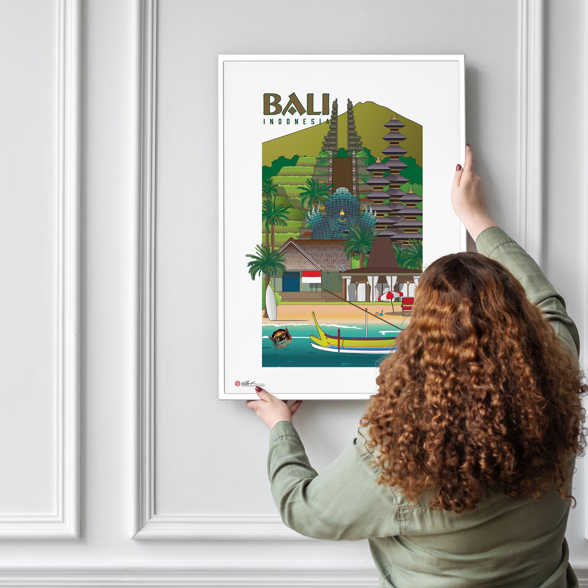 Bali Indonesia souvenir print artwork being hung